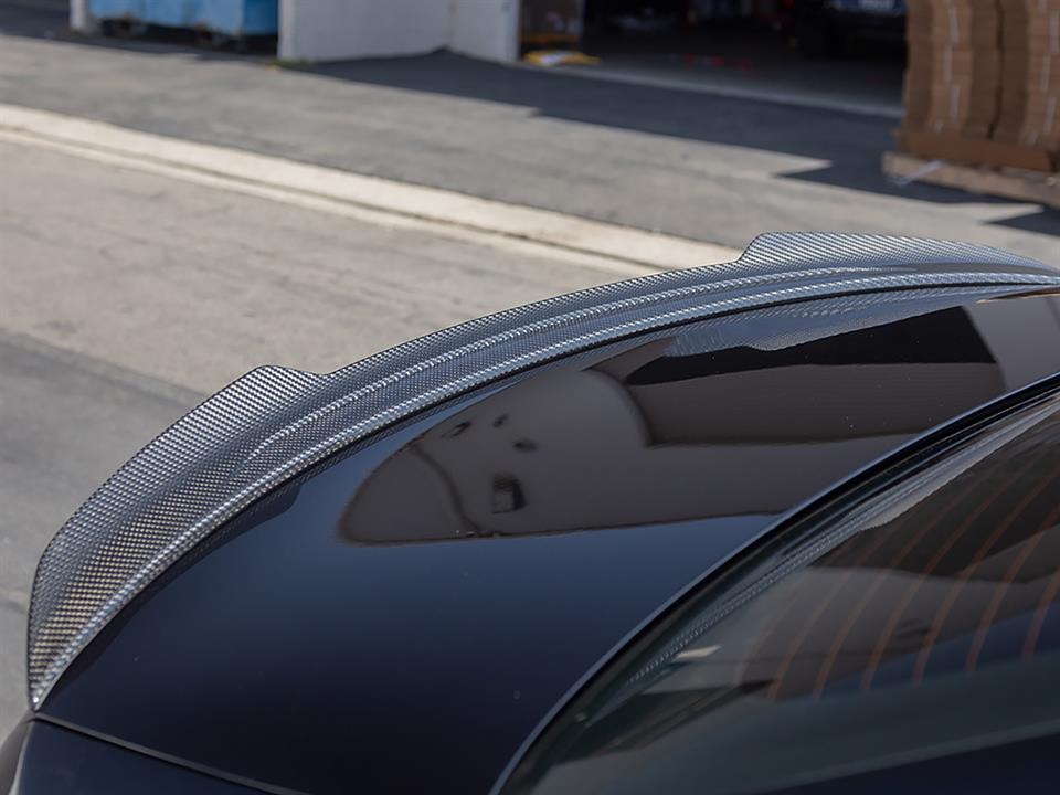 detail shot of the carbon fiber XR W206 spoiler