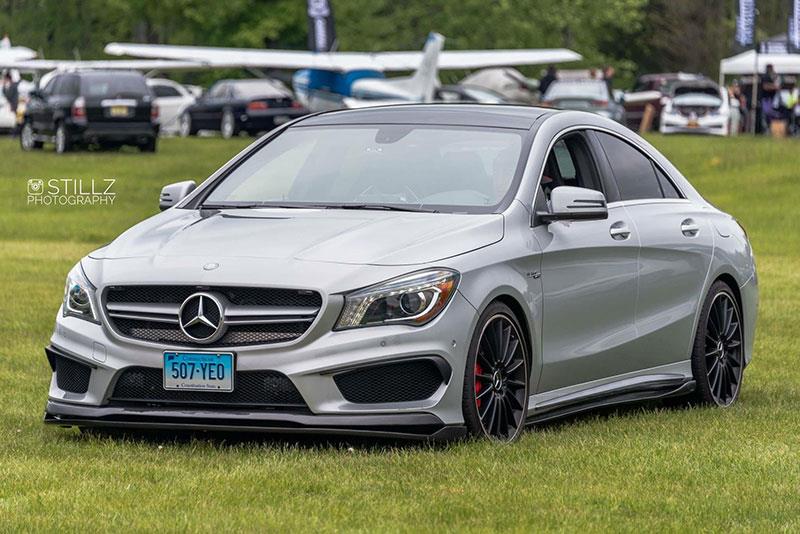 Mercedes C117 CLA outfitted with Revo Style Carbon Fiber Front Lip Spoiler