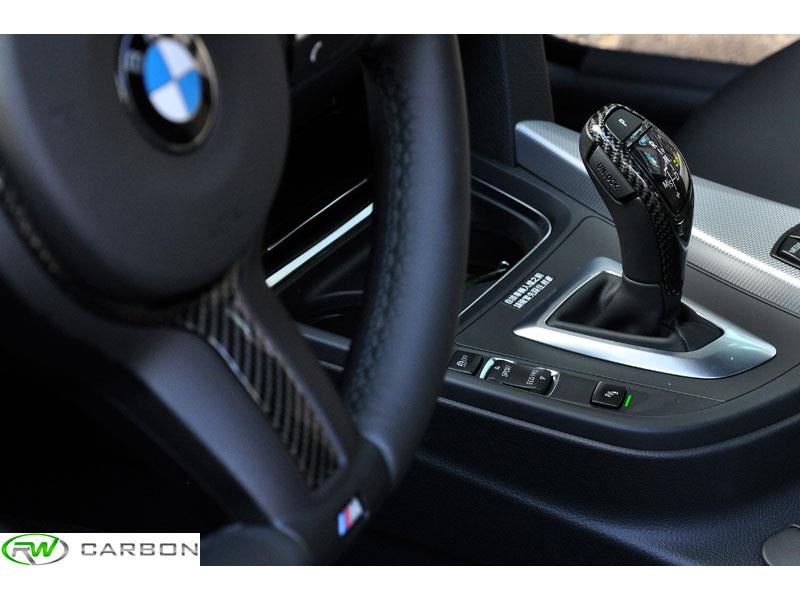 Get a personalized interior with the RW Carbon M Sport Carbon Fiber Gear Selector Cover for your F01, F06, F07, F10, F12, F13, F30, or F32