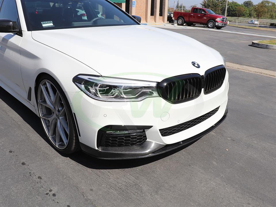White BMW 530e with performance cf front lip