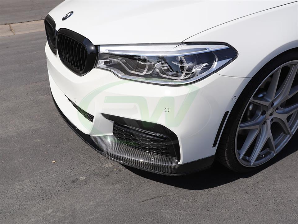 White BMW 530e with performance cf front lip