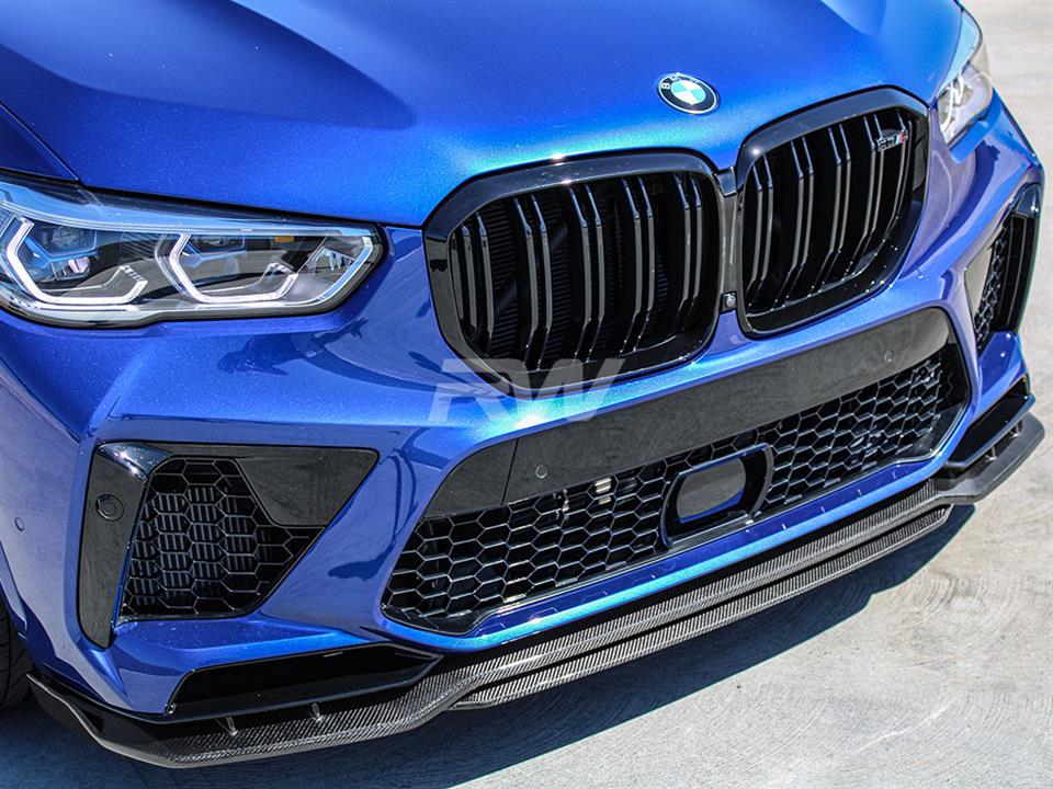 Man style carbon fiber front lip shown on Blue BMW F95 X5M