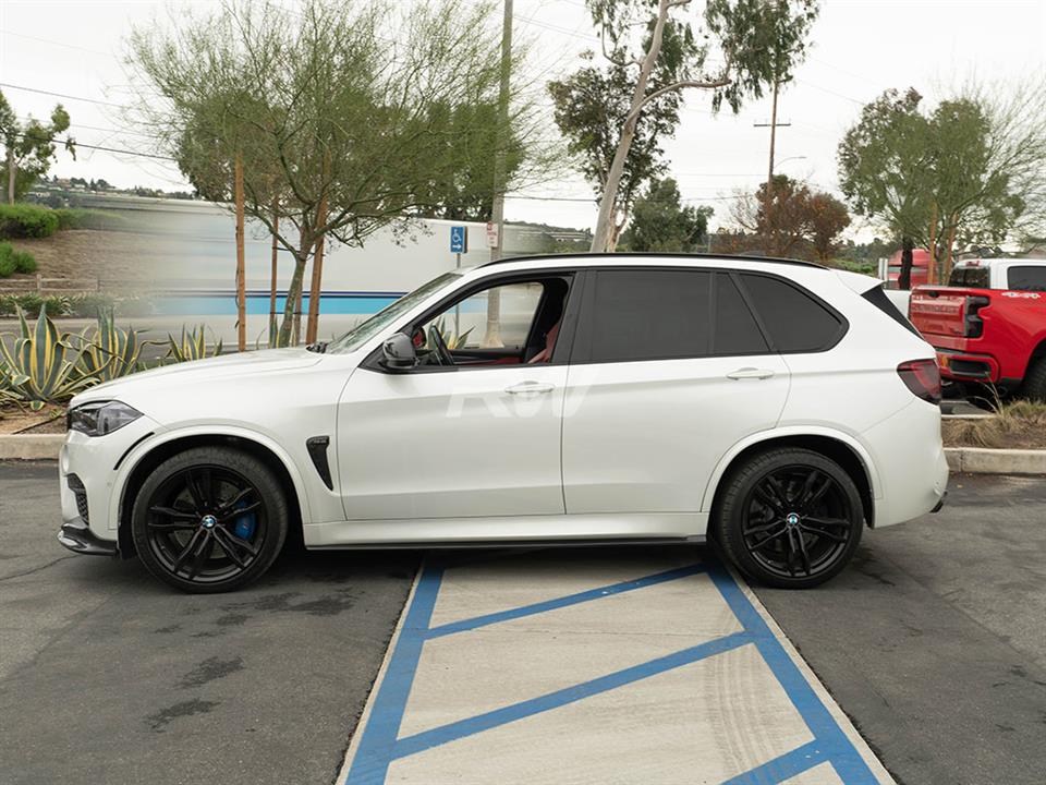 BMW F85 X5M receives a set of RW Carbon Fiber Side Skirt Extensions