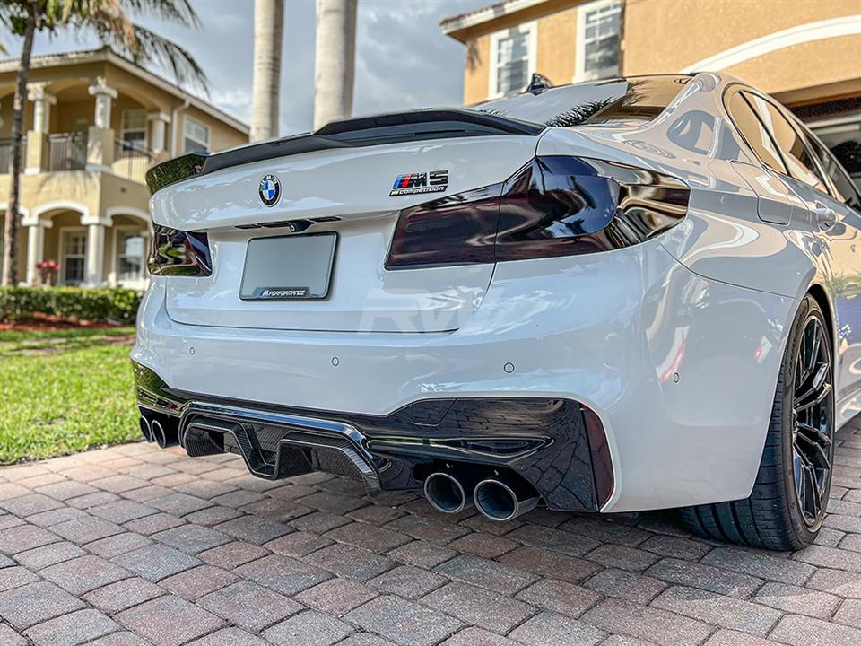BMW F90 M5 competition in white with CS style diffuser in carbon fiber