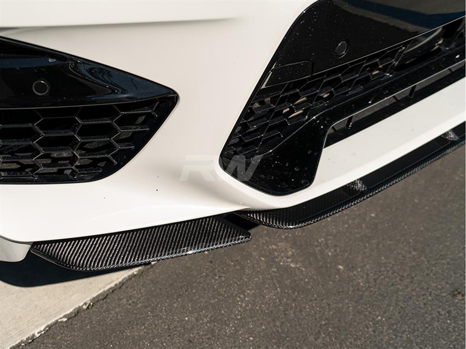 White BMW X3M F97 with carbon fiber front lip