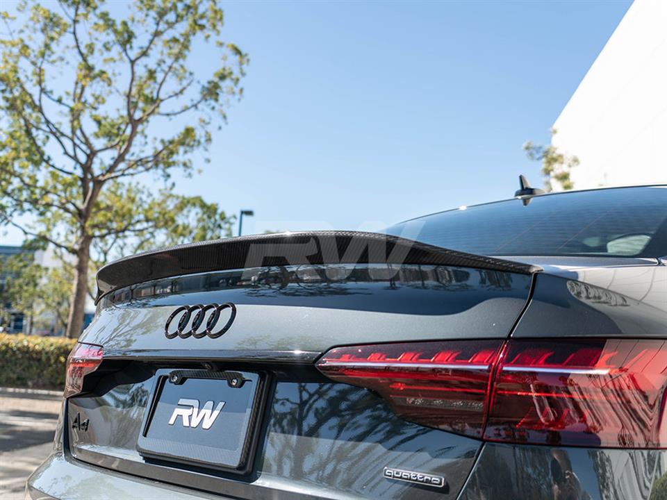 https://www.rwcarbon.com/media/uploads_ckeditor/rw-carbon-fiber-audi-b9-a4-carbon-fiber-trunk-spoiler-5.jpg