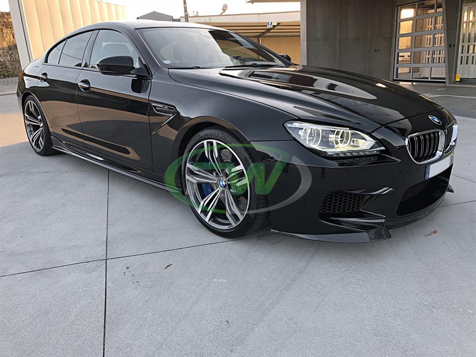 black gran coupe 650i with 3d style carbon fiber side skirts