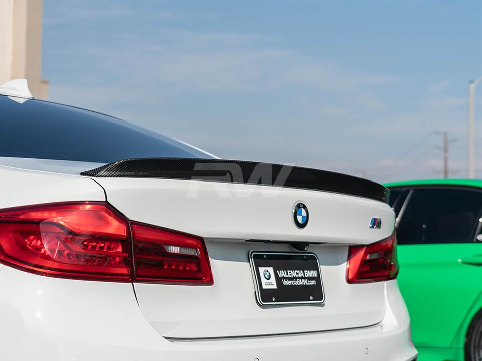 white bmw g30 with a 3d style trunk spoiler from rw