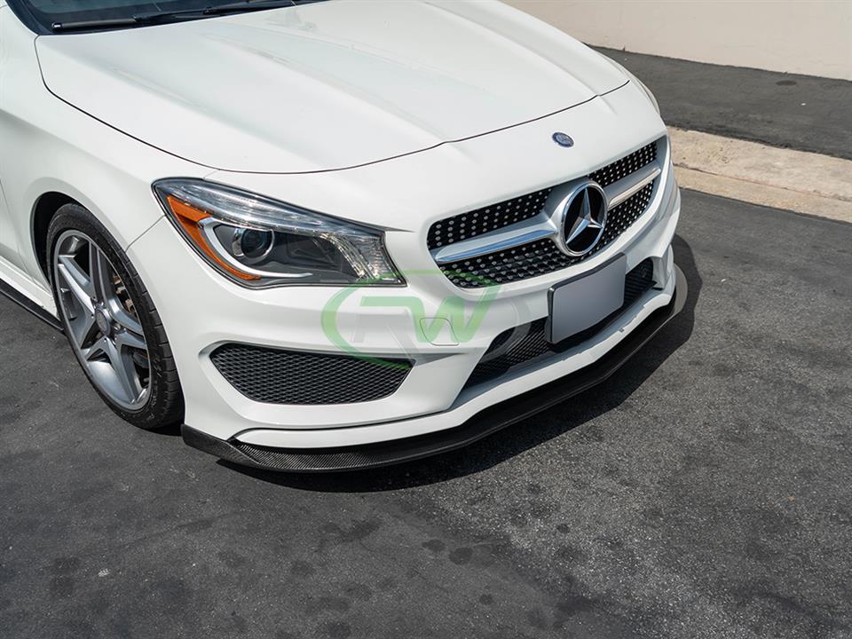 White Mercedes C117 CLA outfitted with Revo Style Carbon Fiber Front Lip