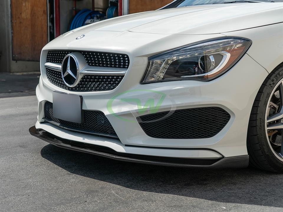 White Mercedes C117 CLA outfitted with Revo Style Carbon Fiber Front Lip