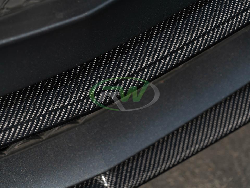 Carbon Fiber Front Trim gets installed on a Mercedes W205 C63 AMG 