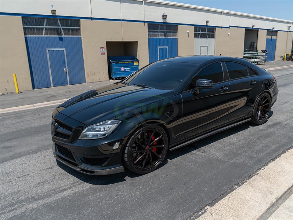 Mercedes W218 CLS63 has a pair of RW Carbon Fiber Side Skirt Extensions